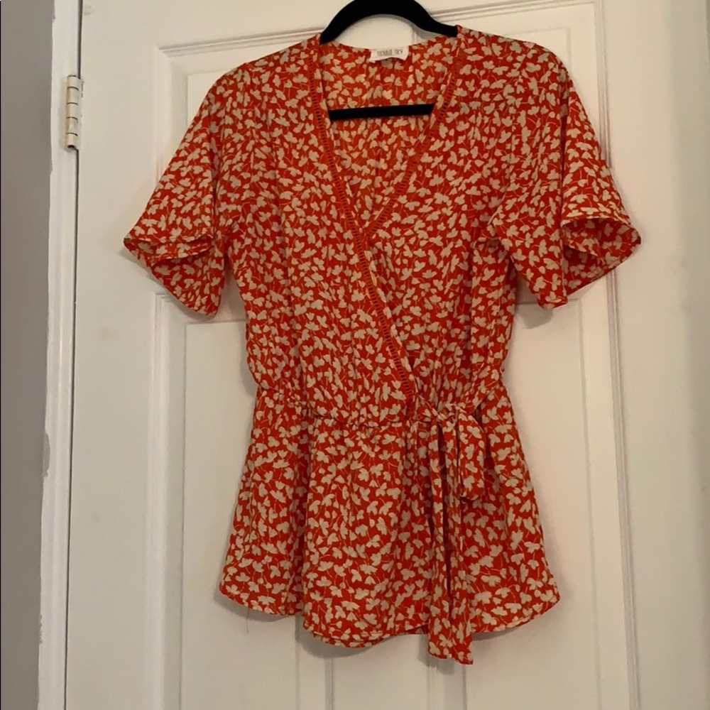 Orange floral wrap top blouse. Size medium.